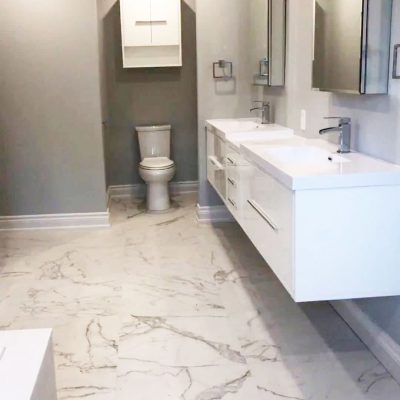  small bathroom with wall mount vanity and marble floor decor - house renovation
