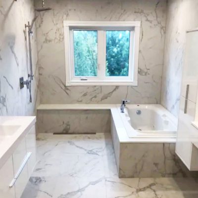 amazing bathroom with luxury bathtub and marble wall and floor decor - bathroom design